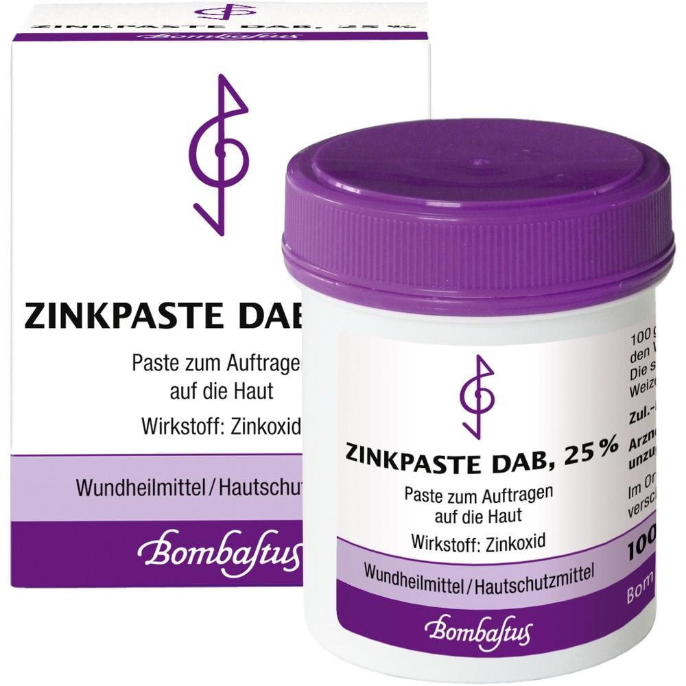 Weiße Dose und Verpackung mit lila Deckel und Aufschrift "Zinkpaste DAB, 25%".
